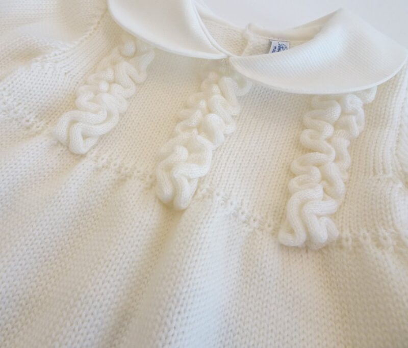 Tutina in lana merinos per neonata