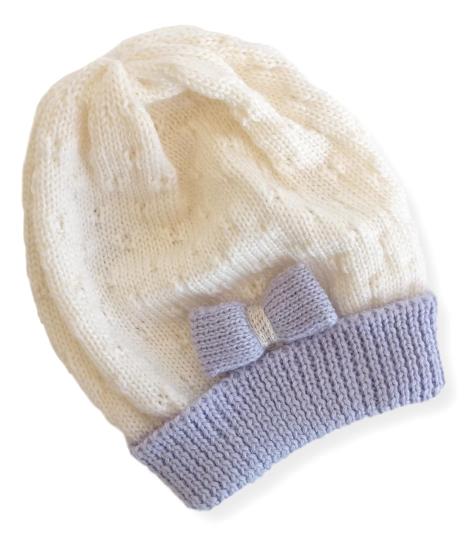 Cappellino in lana merinos per neonata